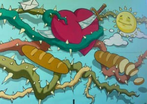Dettaglio del murale con cuore, sole sorridente e rami